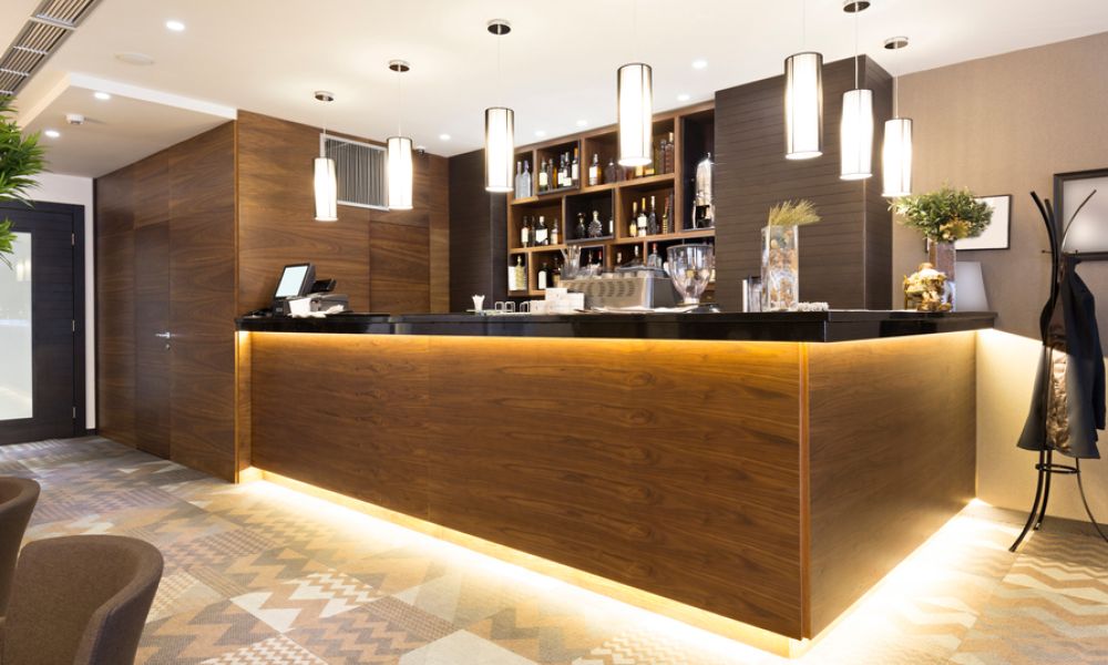 <span class="uk-h4">In-ceiling speakers in a hotel bar area.</span>